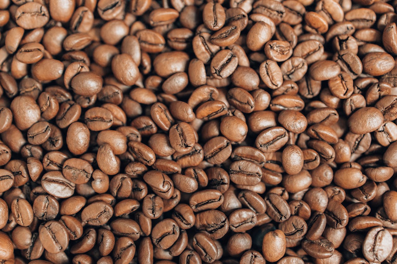 High-quality close-up image of roasted coffee beans showcasing texture and rich brown color.